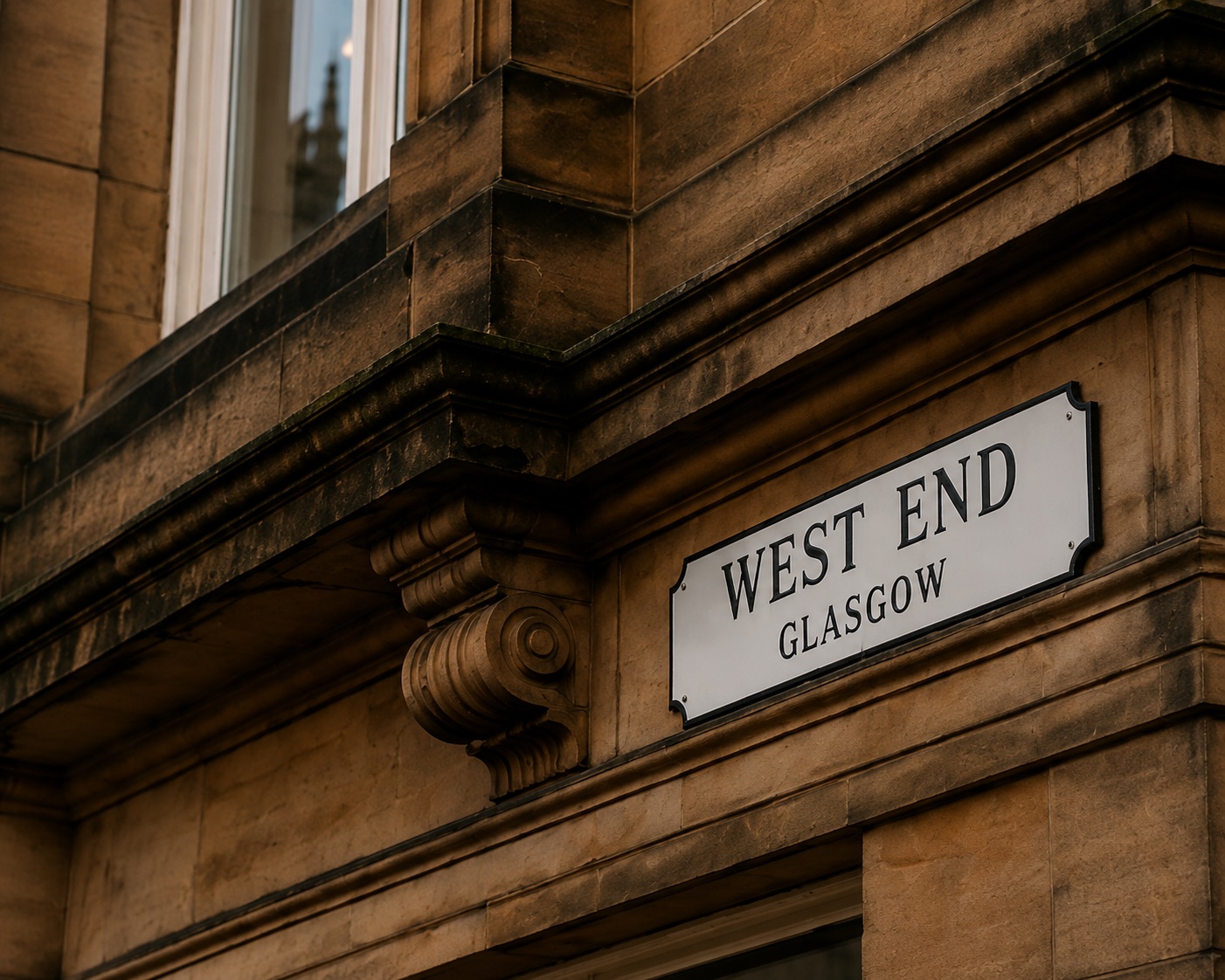 A West End, Glasgow street sign carved into sandstone
